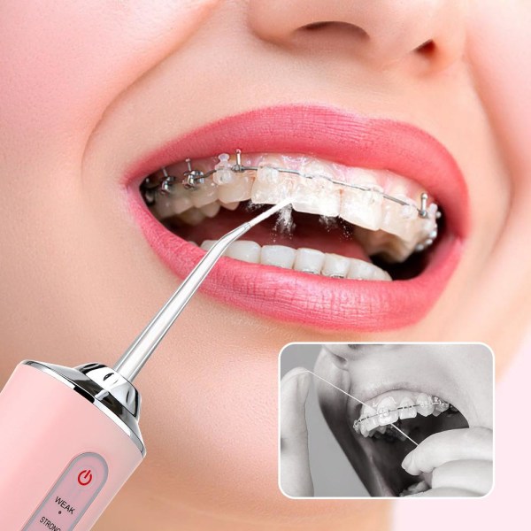håndholdt elektrisk tandpleje tænder rengøring tandhygiejne med vand hvid