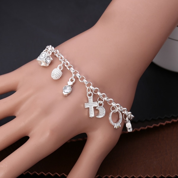 vackert armband/armband med 13 berlocker silver - Perfet