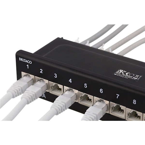 DELTACO kytkentäpaneeli, 12xRJ45, Cat6a, seinäasennus, 10Gbps, musta
