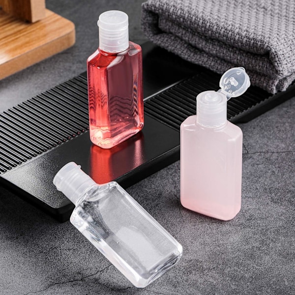 50 st transparenta tomma reseflaskor 30 ml/ 1 oz Flip-Lock tom behållare bärbar påfyllningsbar Flip-Top flaskor för utomhusresor