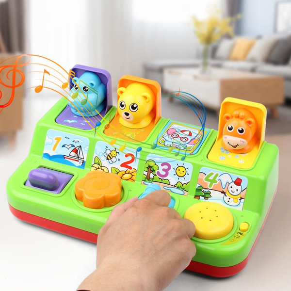 Pop-up interaktiv leksak med musik