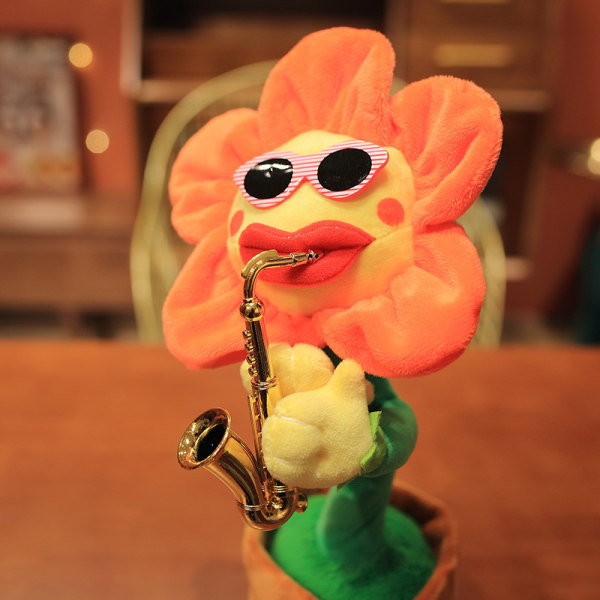 En solros som kan sjunga, dansa, spela in och lära sig prata orange fillet