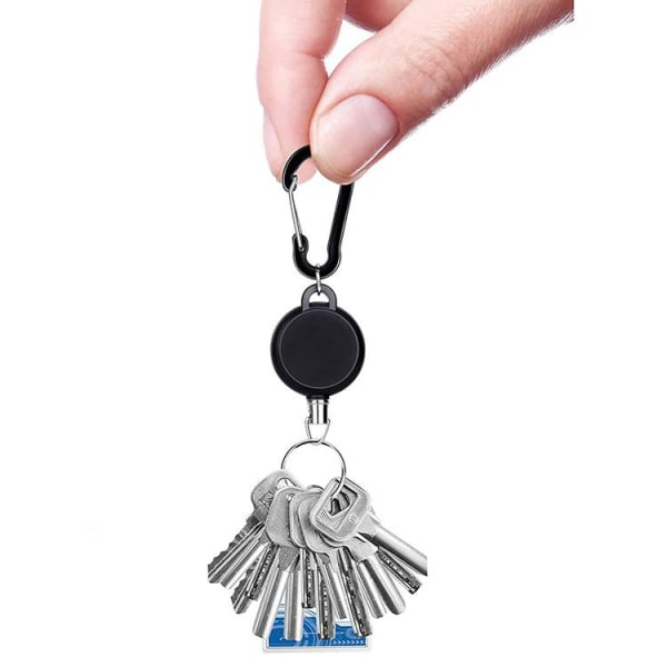 2-pakkainen avaimenperä, joka on laajennettavissa Yo-Jo-toiminnolla ja nauhalla black