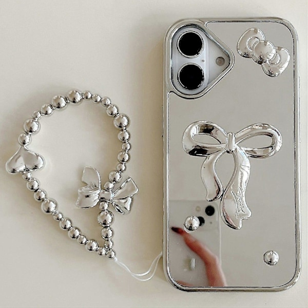 Skal till iPhone 16 3D Rosett Spegelyta Design Telefon Baksida med Rem