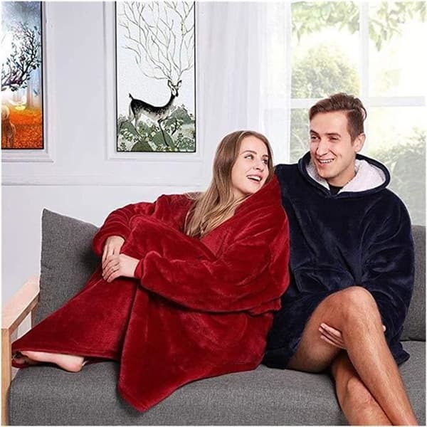 Filt i korallfleece med mjuka ärmar och huva med ytterficka - Blå