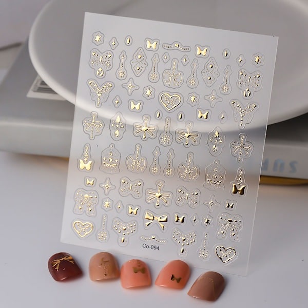Guldpräglade nagelstickers med rosett, handmålade nagelstickers utan nagel, präglad frans, utsökt enfärgad