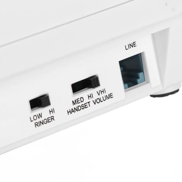 Fastnettelefon med store knapper: En kablet fastnettelefon med store, letlæselige knapper og ringetoner.