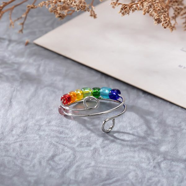 Roterbar färgglada pärlor ring stress ångest lindring öppen justerbar män kvinnor fingerring mode smycken silver