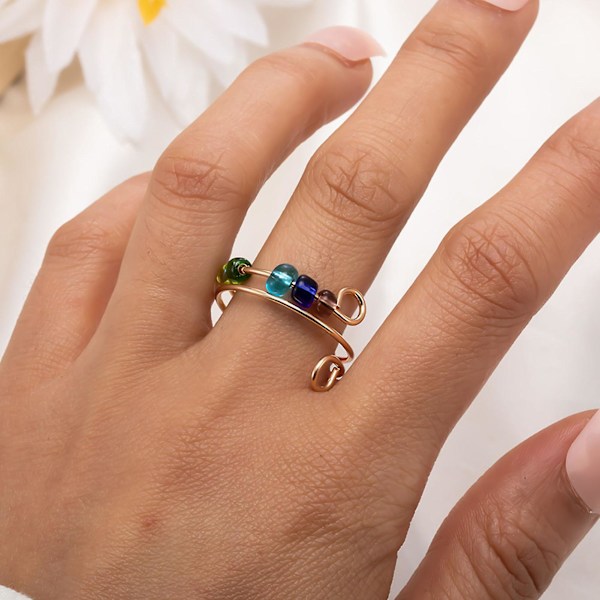 Roterbar färgglada pärlor ring stress ångest lindring öppen justerbar män kvinnor fingerring mode smycken silver