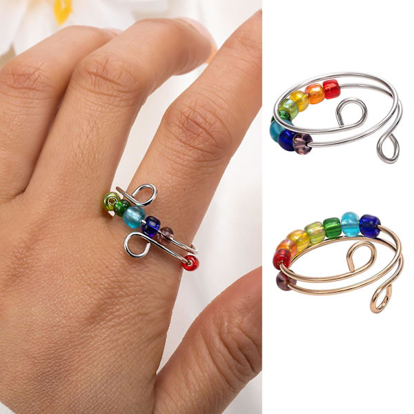 Roterbar färgglada pärlor ring stress ångest lindring öppen justerbar män kvinnor fingerring mode smycken golden