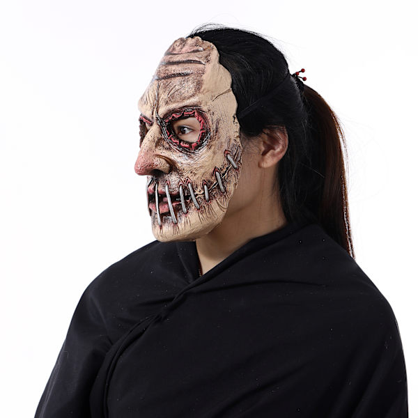 Halloween-juhlan kauhunaamio lateksikummitusfestivaalin simulointi ihmisen pään peite