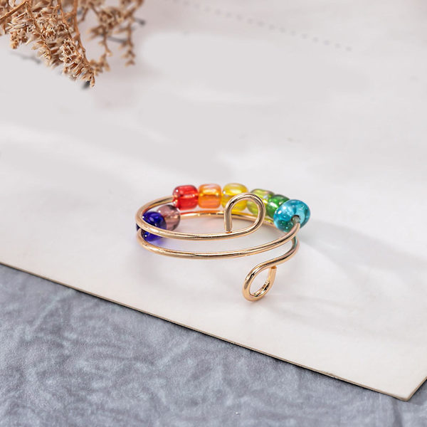 Roterbar färgglada pärlor ring stress ångest lindring öppen justerbar män kvinnor fingerring mode smycken golden