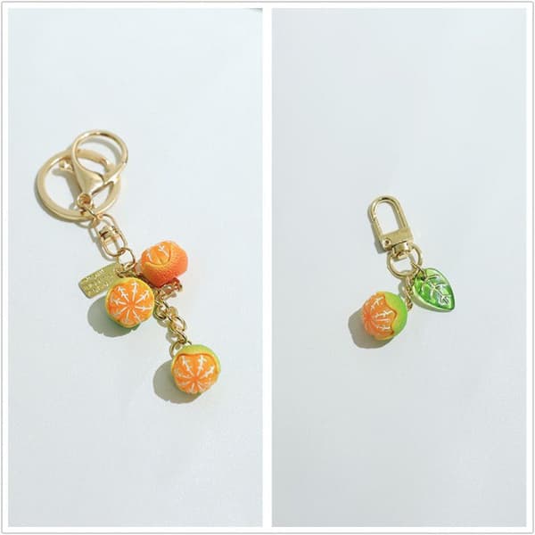e Simulaatio 3D Orange Fruit Avaimenperä Riipus Laukku Charm Puhelin A A2