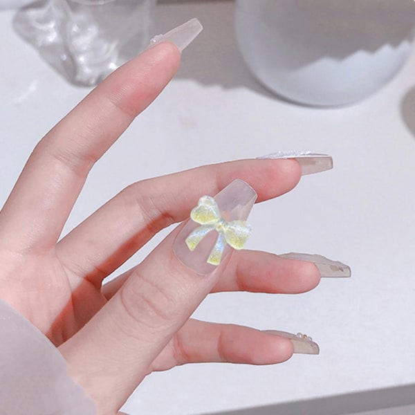 20 stk/pose Resin Glitter Aurora Sløyfe Nail Art Accessory Girl DIY N A4