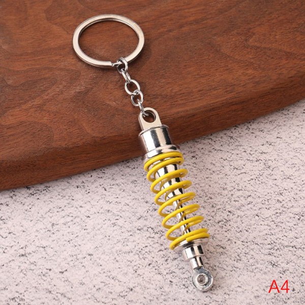 Creative Absorber Keychain Alloy auton sisäinen jousitus Keyri A5