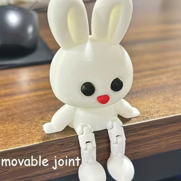 3D-printad prydnad med rörlig, poserbar dockfigur för skrivbordet A5