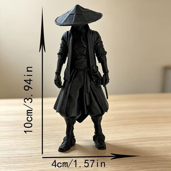 Sort statue med fin 3D-print, perfekt til hjemmekontorbordet
