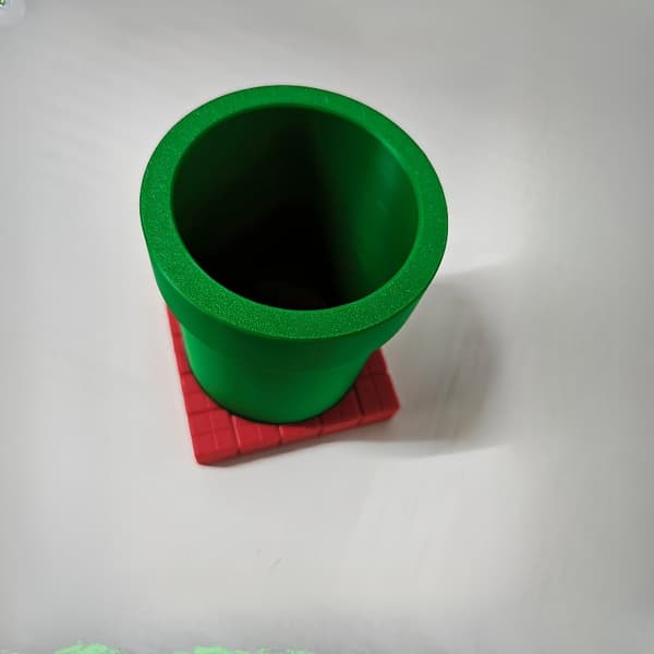 3D-utskriftsmodell Piranha vannpipe er vannpipe blyantholder Green