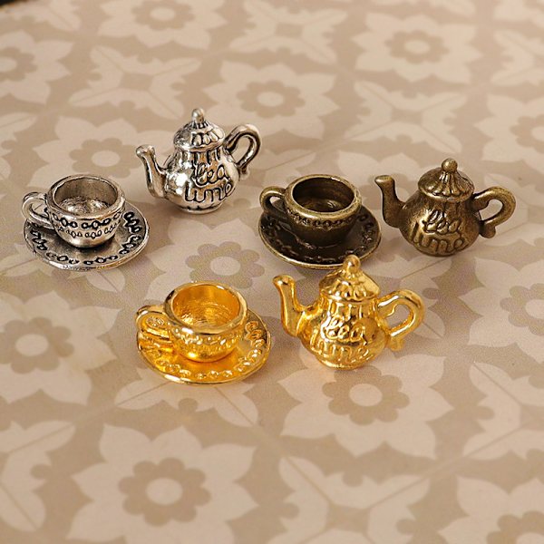 1 sett 1:12 Dukkehus Miniatyr tekanne kopp og tallerkenbord Mod Silver