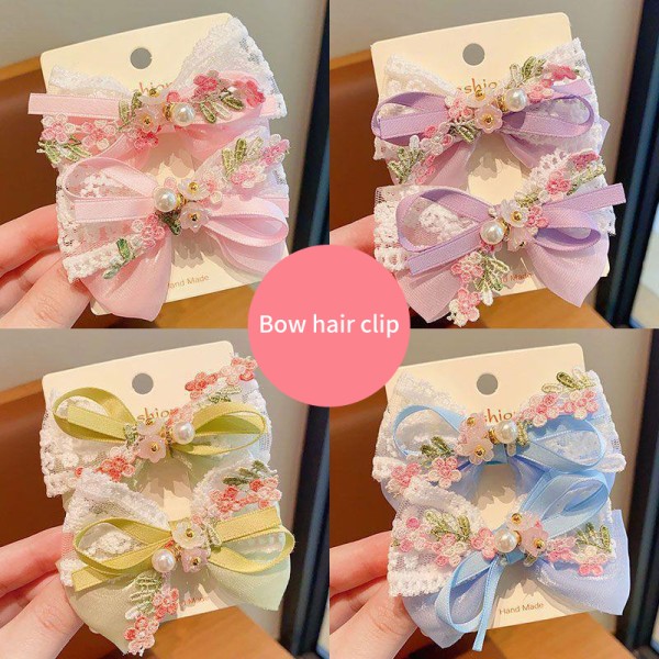 1 Pari söpöä kukkakirjonta Pitsi Pearl Bowknot Barrettes Hiukset Blue