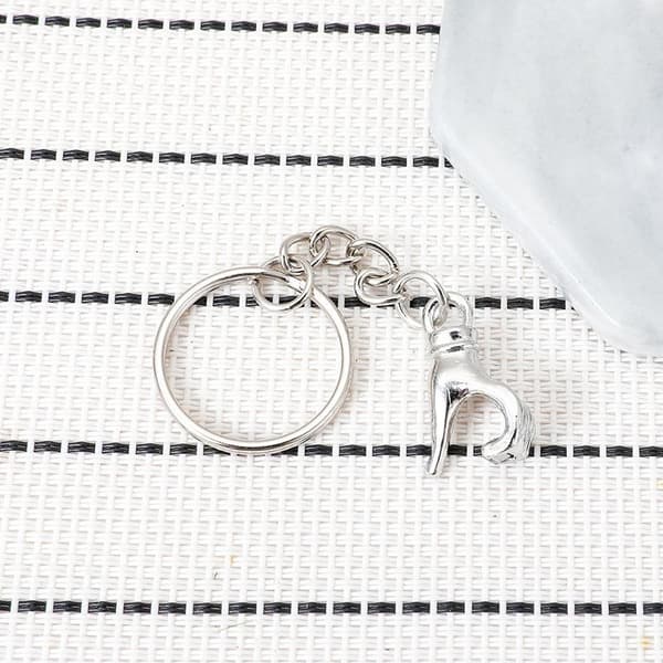 Retro-stil Roliga Silver Magnetiska Par Nyckelringar A