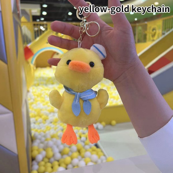 Fluffy plysbold nøglering Lille gul and håndtaske vedhæng K A4