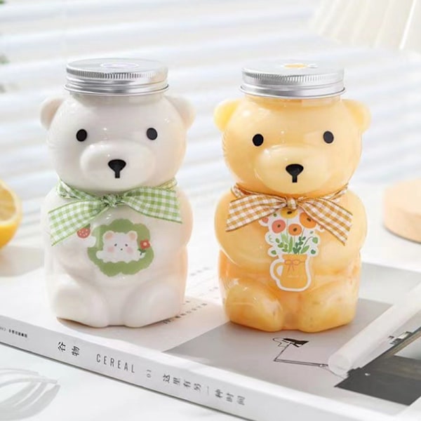 Engangsbruk drikkeflasker e Bear plastkopp juice drikkevarelager 4
