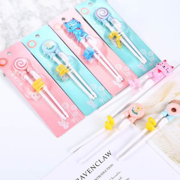 Tegneserie Barn spiser Treningspinner Baby læring servise st Pink lollipop