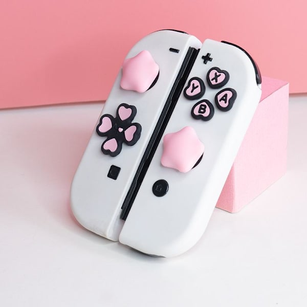 1 uppsättning e hjärtformade silikonknappskydd för NS2 Switch 2 Joy A6