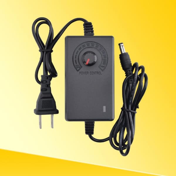 1 stk justerbar strømforsyningsadapter AC til DC 3V-12V 2A/3-24V 1A A1