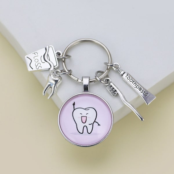 Uusi Creative e Cartoon Pattern Dentist Medal Avaimenperä Hammaslääkäri A7