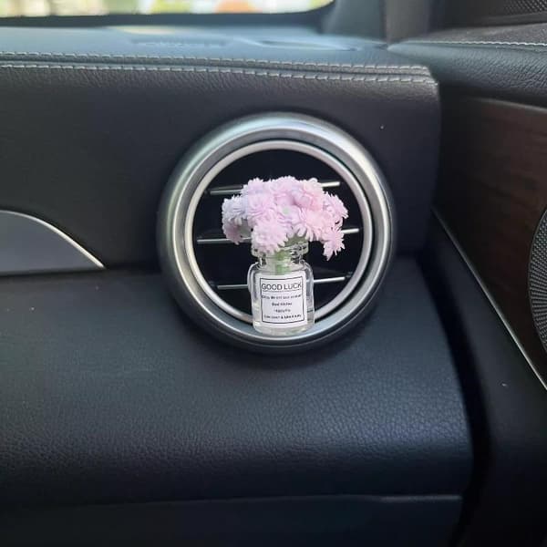Bilens mittkonsol luftutlopp simulerade blomklämmor ornament A9