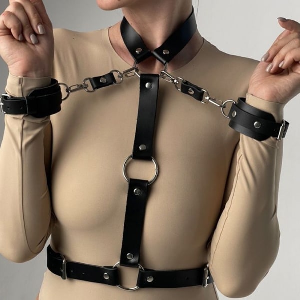 Sexet sort læderkrave og -armbånd til kvinder med integreret