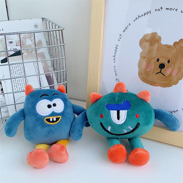Pehmoeläinavaimenperä Little Monster sarjakuvalaukku riipustyttö T Blue