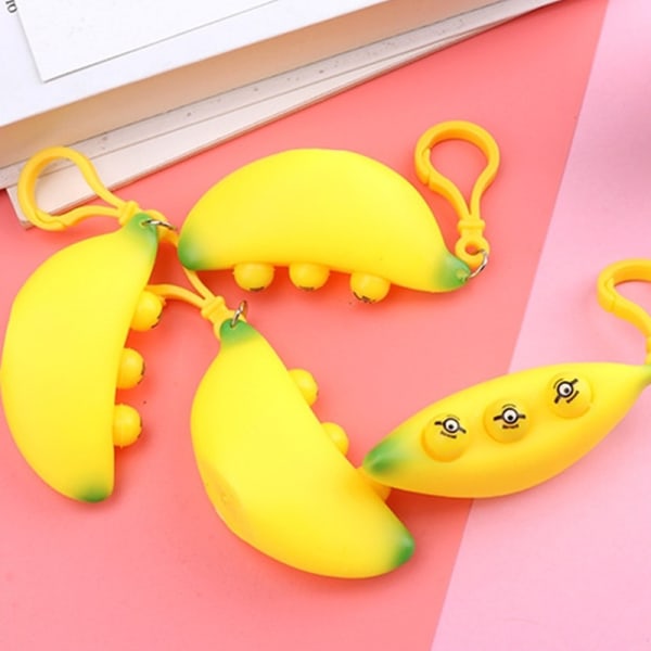 Søt Ekstrudering Banan Stress Relief Toy Nøkkelring Ekstrudering Nie
