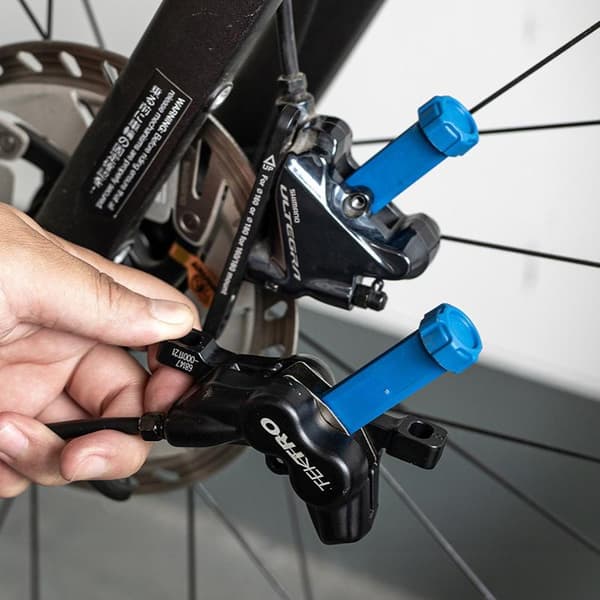 1 stk. stålværktøj til spredning af cykelbremseklodser Blue