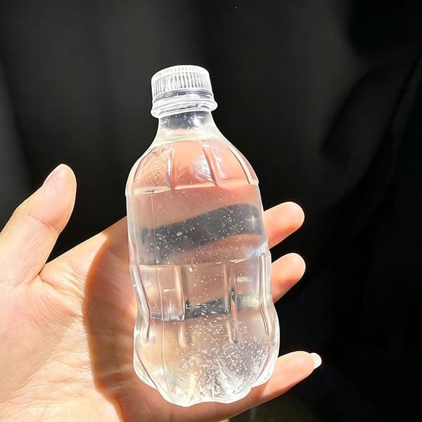 Gjennomsiktig vannflaskeleke Klar geléfidgetleke Sakte stigende A2