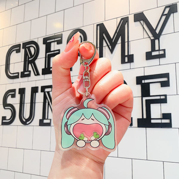 Dynamisk skakbar Hatsune Miku nyckelring Äta grön lök nyckel