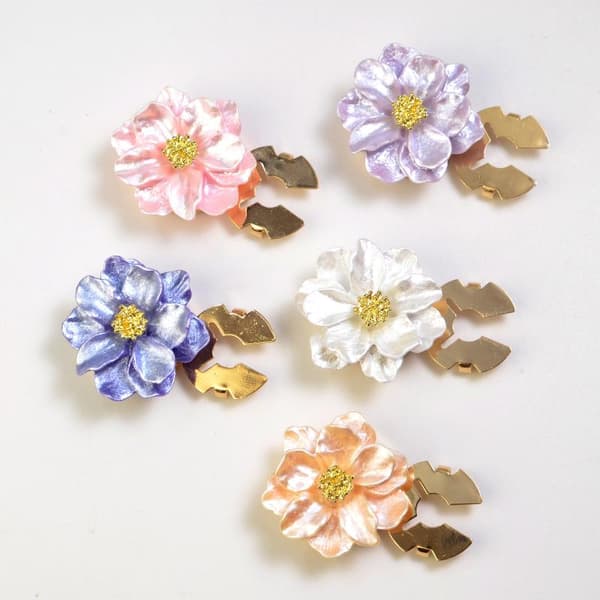 2 stk. manchetknapper med modeblomsterknap A5
