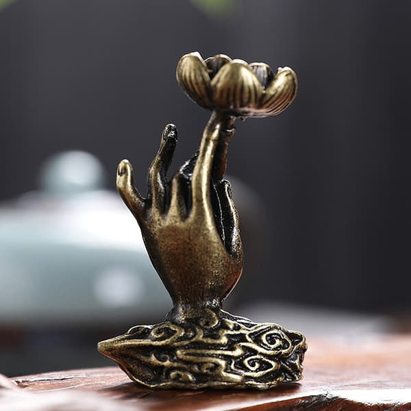 Rökelsehållare i ren koppar med Buddha-hand i mässing