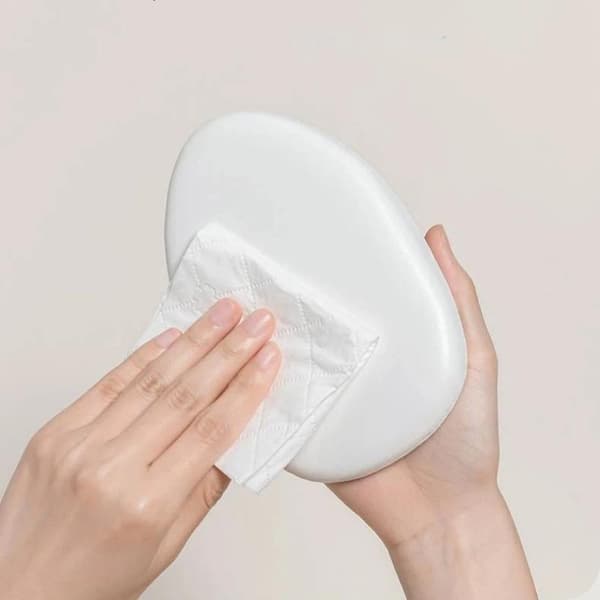 Multifunksjonell lotion- og salveapplikator med myk skinnoverflate A2