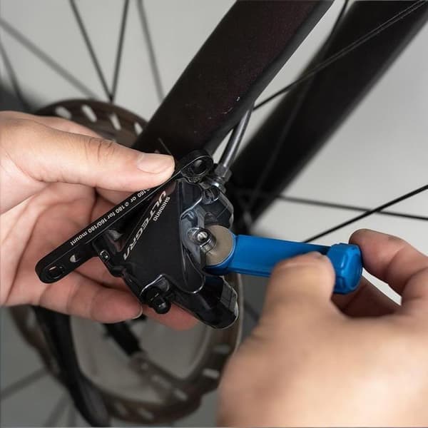 1 stk. stålværktøj til spredning af cykelbremseklodser Blue