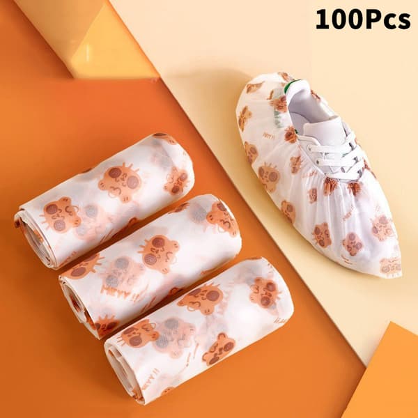 Tecknat tryckt non-woven förtjockade skoskydd engångs inomhus 50Pcs