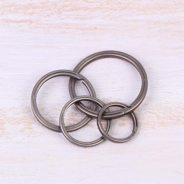 4 stk. Ultralet nøglering i titaniumlegering, metal, hård side-pushin