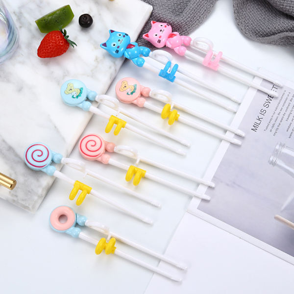 Sarjakuva Lapset syövät Harjoituskepit Baby Learning Tableware st Donut