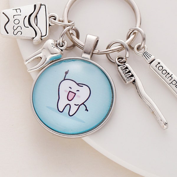 Uusi Creative e Cartoon Pattern Dentist Medal Avaimenperä Hammaslääkäri A10