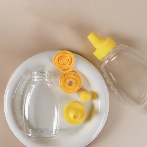 Plastikhonungsflaskor Läckagesäker Honungsburkflaska med Flip-lock B2