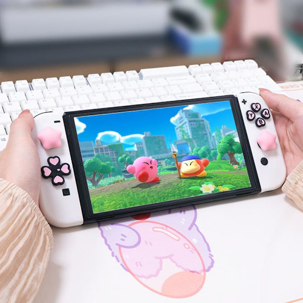 1 uppsättning e hjärtformade silikonknappskydd för NS2 Switch 2 Joy A2
