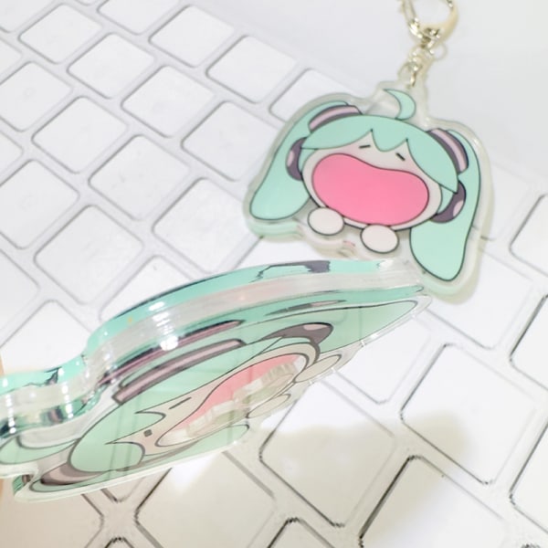 Dynamisk Shakeable Hatsune Miku nøkkelring Eating Green Onion Keyr