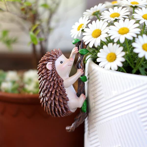 Klättrande igelkottfigur Blomkrukekramare